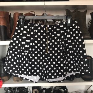 Polka dotted high waisted pleated shirts. Size 4.